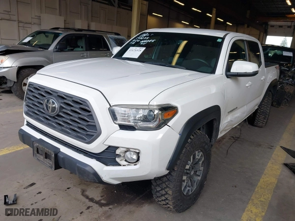 2020 Toyota Tacoma 4WD SR5 with VIN 5TFCZ5AN6LX235847, listed as a IAAI auction lot 41676928 with 77,384 mi miles. Bid and sale history available at carsss.com. Image 17.