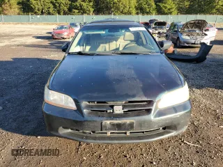 2000 Honda Accord EX z VIN JHMCG5659YC033886, wystawiony jako Copart lot #87952845 z przebiegiem 317 730 mil mil oraz Szkoda całkowita • Salvage title. Historia ofert i sprzedaży dostępna na DreamBid. Obrazek 5.