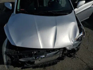 2012 Hyundai Accent SE z VIN KMHCU5AE2CU010532, wystawiony jako Copart lot #49165705 z przebiegiem Nie podano mil oraz Szkoda całkowita • Salvage title. Historia ofert i sprzedaży dostępna na DreamBid. Obrazek 11.
