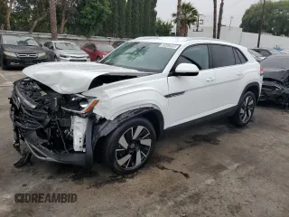 2025 Volkswagen Atlas SE z VIN 1V2WE2CA6SC200148, wystawiony jako Copart lot #60463995 z przebiegiem 14 610 mil mil oraz Czysty tytuł • Clean title. Historia ofert i sprzedaży dostępna na DreamBid. Obrazek 1.