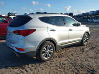 2018 Hyundai Santa Fe 2.0T z VIN 5XYZU4LA1JG516466, wystawiony jako IAAI lot #42265607 z przebiegiem 110 655 mil mil oraz . Historia ofert i sprzedaży dostępna na DreamBid. Obrazek 4.