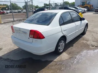 2002 Honda Civic LX with VIN 1HGES16532L069101, listed as a IAAI auction lot 42122929 with 101,269 mi miles and . Bid and sale history available at DreamBid. Image 4.