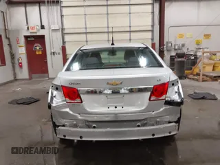 2014 Chevrolet Cruze 1LT z VIN 1G1PC5SB8E7117110, wystawiony jako IAAI lot #42224375 z przebiegiem 81 921 mil mil oraz . Historia ofert i sprzedaży dostępna na DreamBid. Obrazek 17.