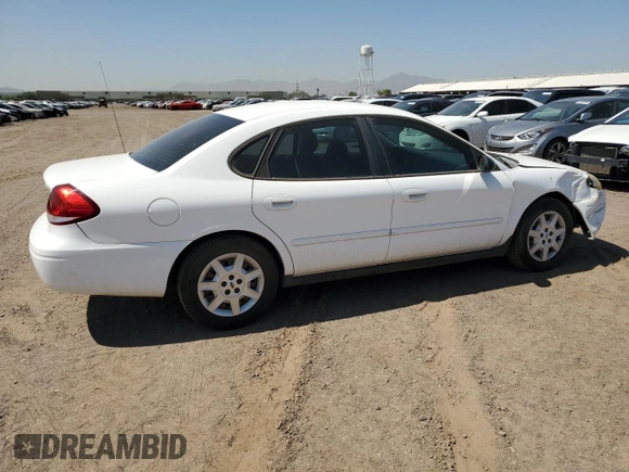 2006 Ford Taurus SE with VIN 1FAFP53UX6A194398, listed as a Copart auction lot 59582515 with 114,933 mi miles and Salvage title. Bid and sale history available at DreamBid. Image 3.