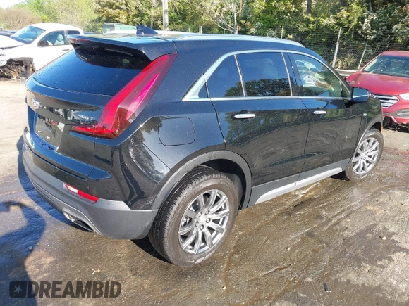 2021 Cadillac XT4 FWD Premium Luxury with VIN 1GYFZCR43MF052422, listed as a IAAI auction lot 41985859 with 25,112 mi miles. Bid and sale history available at carsss.com. Image 4.