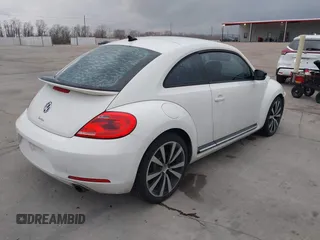 2012 Volkswagen Beetle Turbo with VIN 3VWVA7AT3CM650301, listed as a IAAI auction lot 41525503 with Not Provided miles and . Bid and sale history available at DreamBid. Image 4.