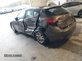 2015 Mazda 3 i Grand Touring z VIN JM1BM1M70F1222597, wystawiony jako IAAI lot #41960987 z przebiegiem 40 841 mil mil oraz . Historia ofert i sprzedaży dostępna na DreamBid. Obrazek 3.