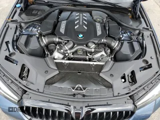2023 BMW 5 Series M550i xDrive with VIN WBA13BK06PCM31937, listed as a Copart auction lot 66490494 with 24,972 mi miles and Salvage title. Bid and sale history available at DreamBid. Image 11.