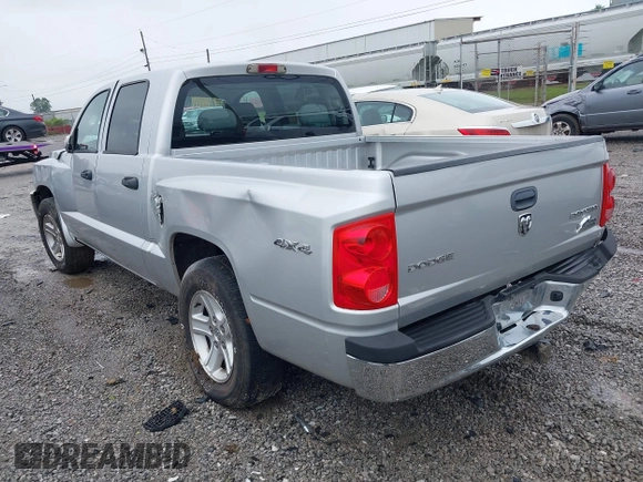 2010 Dodge Dakota Bighorn/Lonestar z VIN 1D7CW3GK4AS140049, wystawiony jako IAAI lot #42231805 z przebiegiem 149 489 mil mil oraz . Historia ofert i sprzedaży dostępna na DreamBid. Obrazek 3.