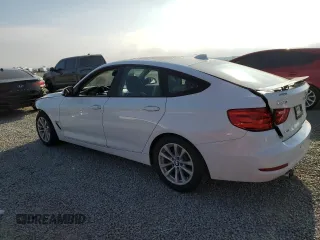 2014 BMW 3 Series 328i Gran Turismo xDrive with VIN WBA3X5C57ED242679, listed as a Copart auction lot 48598665 with 69,712 mi miles and Salvage title. Bid and sale history available at DreamBid. Image 2.