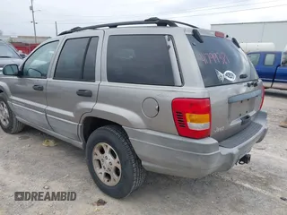 1999 Jeep Grand Cherokee Laredo с VIN 1J4GW58N4XC676836, выставлен на аукционе IAAI как лот 41799381 с пробегом 203 784 миль миль и . История ставок и продаж доступна на DreamBid. Изображение 3.