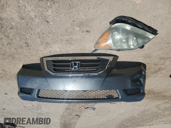 2008 Honda Odyssey EX-L z VIN 5FNRL38748B408516, wystawiony jako Copart lot #55394745 z przebiegiem 144 176 mil mil oraz Szkoda całkowita • Salvage title. Historia ofert i sprzedaży dostępna na DreamBid. Obrazek 13.