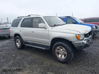 1997 Toyota 4Runner SR5 with VIN JT3HN86R1V0127022, listed as a IAAI auction lot 41483973 with 165,570 mi miles. Bid and sale history available at carsss.com. Image 1.