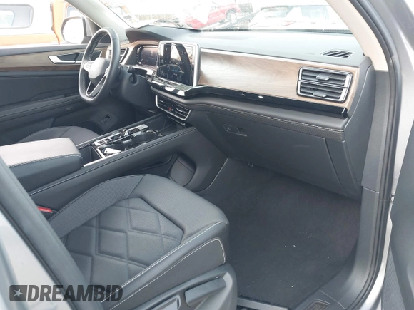 2024 Volkswagen Atlas SE with VIN 1V2WR2CA6RC566660, listed as a IAAI auction lot 41255378 with 12,814 mi miles and . Bid and sale history available at DreamBid. Image 5.