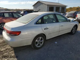 2006 Hyundai Azera SE with VIN KMHFC46FX6A136882, listed as a Copart auction lot 77377864 with 165,124 mi miles and Salvage Title. Bid and sale history available at carsss.com. Image 3.