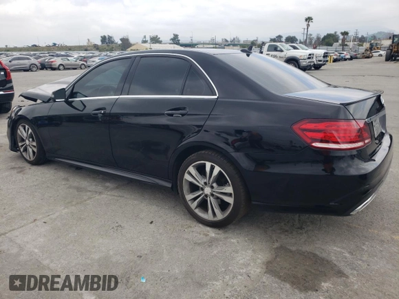 2014 Mercedes-Benz E 350 Sport with VIN WDDHF5KB7EB050618, listed as a Copart auction lot 50875045 with 157,722 mi miles and Salvage Title. Bid and sale history available at DreamBid. Image 2.