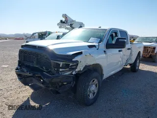2023 Ram 2500 Tradesman with VIN 3C6UR5HJXPG631739, listed as a IAAI auction lot 41382584 with 45,385 mi miles. Bid and sale history available at carsss.com. Image 2.