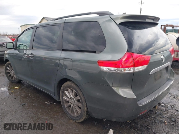 2013 Toyota Sienna XLE with VIN 5TDDK3DC7DS068591, listed as a IAAI auction lot 41483280 with 197,599 mi miles and . Bid and sale history available at DreamBid. Image 3.