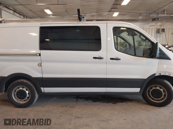 2019 Ford Transit with VIN 1FTYE1YM0KKB77849, listed as a IAAI auction lot 42175880 with 151,828 mi miles. Bid and sale history available at carsss.com. Image 12.