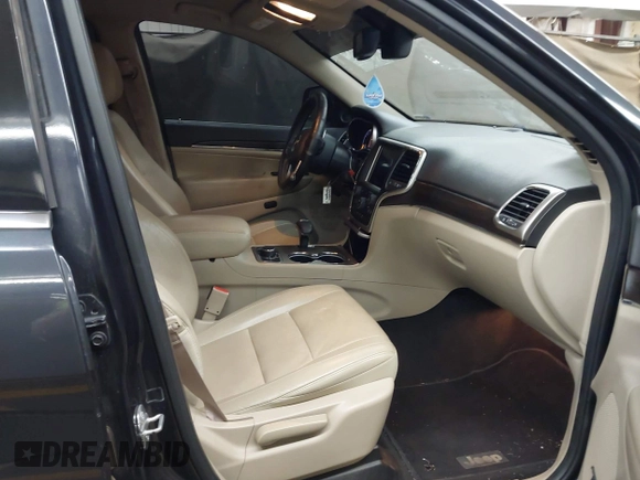 2014 Jeep Grand Cherokee Limited z VIN 1C4RJFBG6EC545417, wystawiony jako IAAI lot #42288236 z przebiegiem 130 229 mil mil oraz . Historia ofert i sprzedaży dostępna na DreamBid. Obrazek 5.