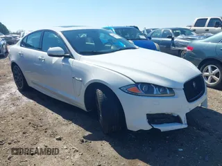 2015 Jaguar XF V6 Portfolio with VIN SAJWJ0FF9F8U48932, listed as a IAAI auction lot 41696899 with 203,110 mi miles. Bid and sale history available at carsss.com. Image 1.
