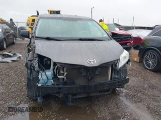2014 Toyota Sienna XLE with VIN 5TDYK3DC0ES502482, listed as a IAAI auction lot 41910683 with 151,330 mi miles. Bid and sale history available at carsss.com. Image 13.