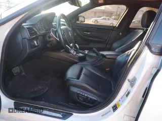 2015 BMW 4 Series 435i xDrive with VIN WBA4B3C59FGV48533, listed as a Copart auction lot 87441184 with 102,482 mi miles and Salvage Title. Bid and sale history available at DreamBid. Image 7.