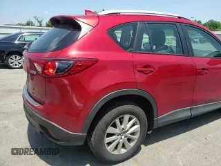 2016 Mazda CX-5 Sport with VIN JM3KE4BY3G0765905, listed as a Copart auction lot 61874165 with 134,546 mi miles and Salvage title. Bid and sale history available at DreamBid. Image 14.