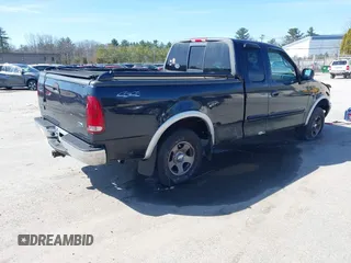 2001 Ford F-150 XL with VIN 2FTRX18L01CA83673, listed as a IAAI auction lot 41943618 with 130,717 mi miles. Bid and sale history available at carsss.com. Image 4.