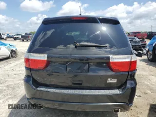 2013 Dodge Durango SXT with VIN 1C4RDHAG1DC651146, listed as a Copart auction lot 60154305 with 185,268 mi miles and Clean title. Bid and sale history available at DreamBid. Image 6.