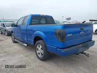 2009 Ford F-150 STX with VIN 1FTRX12W09KA69038, listed as a IAAI auction lot 41520939 with 220,092 mi miles. Bid and sale history available at carsss.com. Image 3.