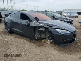 2021 Tesla Model S Plaid with VIN 5YJSA1E6XMF456295, listed as a Copart auction lot 55877025 with Not provided miles and Salvage title. Bid and sale history available at DreamBid. Image 4.