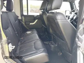 2017 Jeep Wrangler Unlimited Sahara with VIN 1C4BJWEGXHL595724, listed as a IAAI auction lot 42018264 with 95,948 mi miles. Bid and sale history available at carsss.com. Image 8.