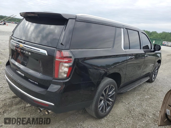 2023 Chevrolet Suburban Premier with VIN 1GNSCFKD4PR467132, listed as a Copart auction lot 57765515 with 25,934 mi miles and Clean title. Bid and sale history available at DreamBid. Image 3.