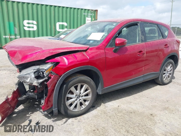 2016 Mazda CX-5 Sport with VIN JM3KE2BY9G0911535, listed as a IAAI auction lot 41906402 with 134,477 mi miles. Bid and sale history available at carsss.com. Image 18.