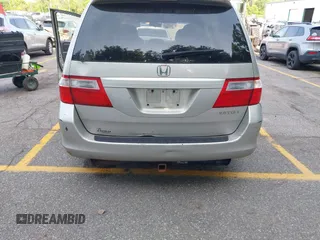 2005 Honda Odyssey EX-L with VIN 5FNRL38715B003399, listed as a IAAI auction lot 42589092 with 252,737 mi miles and . Bid and sale history available at DreamBid. Image 12.
