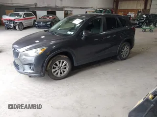 2015 Mazda CX-5 Touring with VIN JM3KE4CY6F0510002, listed as a IAAI auction lot 42045284 with 88,949 mi miles and . Bid and sale history available at DreamBid. Image 18.