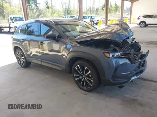 2023 Mazda CX-50 Premium Plus z VIN 7MMVABEY8PN100311, wystawiony jako IAAI lot #42626276 z przebiegiem 40 242 mil mil oraz . Historia ofert i sprzedaży dostępna na DreamBid. Obrazek 1.