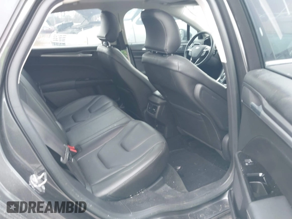 2016 Ford Fusion Titanium with VIN 3FA6P0K94GR183257, listed as a IAAI auction lot 41374728 with 67,780 mi miles and . Bid and sale history available at carsss.com. Image 8.