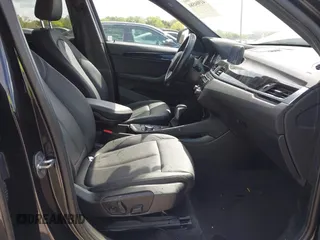 2019 BMW X1 sDrive28i with VIN WBXHU7C56K5L10962, listed as a IAAI auction lot 41904580 with 37,213 mi miles. Bid and sale history available at carsss.com. Image 5.