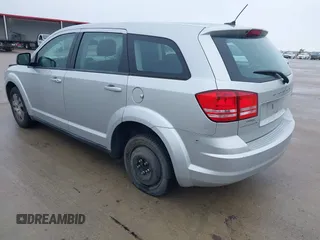 2014 Dodge Journey SE Plus with VIN 3C4PDCAB1ET181480, listed as a IAAI auction lot 41441341 with 189,641 mi miles and . Bid and sale history available at DreamBid. Image 3.