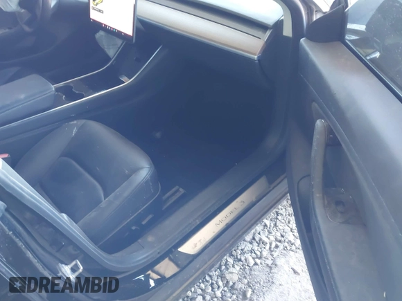 2019 Tesla Model 3 Mid Range with VIN 5YJ3E1EA4KF399151, listed as a IAAI auction lot 41840425 with Not Provided miles and . Bid and sale history available at DreamBid. Image 5.