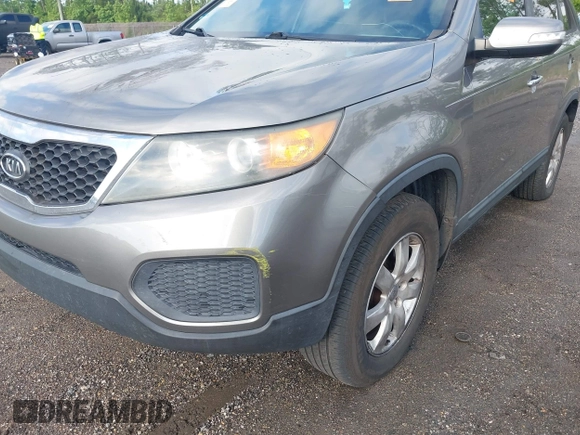 2012 Kia Sorento LX with VIN 5XYKT3A19CG283778, listed as a IAAI auction lot 42259689 with 211,493 mi miles and . Bid and sale history available at DreamBid. Image 6.