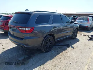 2018 Dodge Durango GT with VIN 1C4RDJDG9JC386748, listed as a IAAI auction lot 41985780 with 103,819 mi miles and . Bid and sale history available at DreamBid. Image 4.