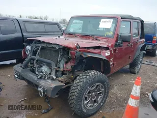2007 Jeep Wrangler Unlimited Sahara with VIN 1J4GA59177L162022, listed as a IAAI auction lot 41887599 with 207,358 mi miles and . Bid and sale history available at DreamBid. Image 16.