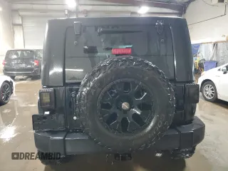 2008 Jeep Wrangler Unlimited X with VIN 1J4GA39158L610358, listed as a Copart auction lot 51274345 with 179,076 mi miles and Salvage Title. Bid and sale history available at DreamBid. Image 6.