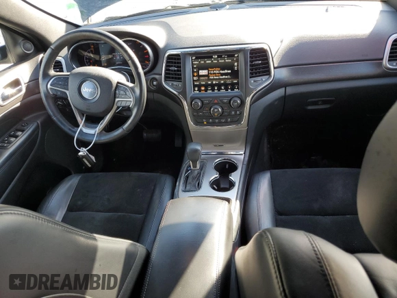 2018 Jeep Grand Cherokee Laredo E with VIN 1C4RJEAGXJC246874, listed as a Copart auction lot 56722005 with 101,493 mi miles and Salvage title. Bid and sale history available at DreamBid. Image 8.