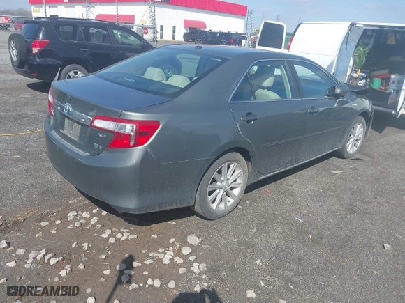 2014 Toyota Camry Hybrid LE with VIN 4T1BD1FK6EU129691, listed as a IAAI auction lot 41796112 with 264,392 mi miles. Bid and sale history available at carsss.com. Image 4.