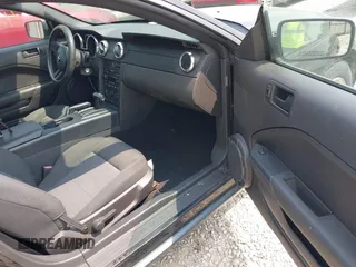 2005 Ford Mustang Deluxe z VIN 1ZVFT80N355240212, wystawiony jako IAAI lot #42426192 z przebiegiem 68 742 mil mil oraz . Historia ofert i sprzedaży dostępna na DreamBid. Obrazek 5.