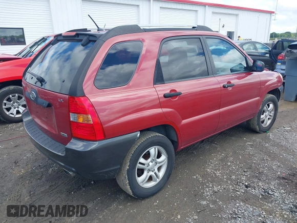 2006 Kia Sportage LX with VIN KNDJF723567236257, listed as a IAAI auction lot 42241914 with 185,503 mi miles and . Bid and sale history available at DreamBid. Image 4.